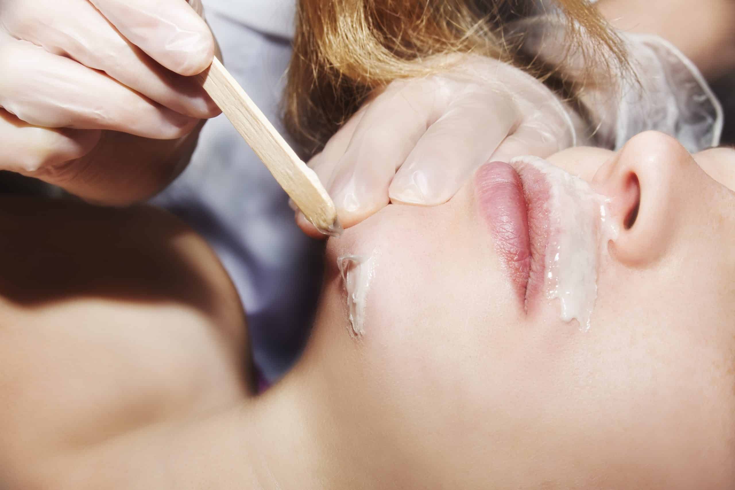 Close-up of skin right after side of face waxing aftercare